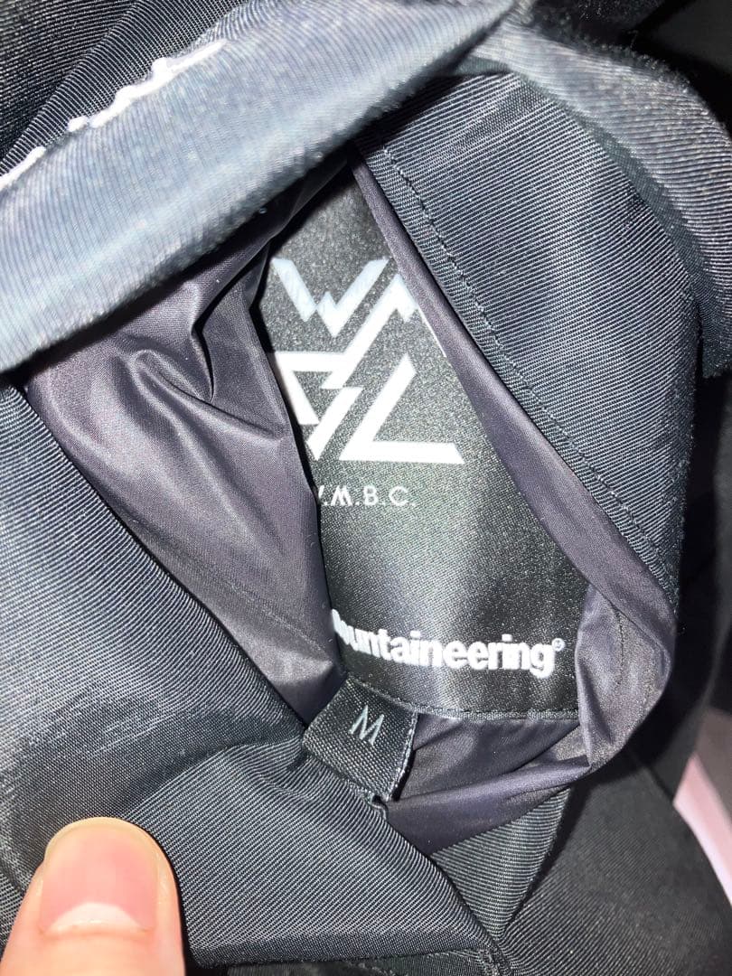 gWhite Mountaineering × TAION ダウンパーカー