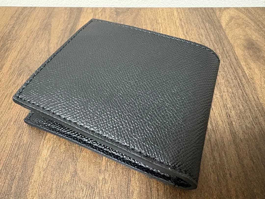 【新品】コーチ　ブラックレザー二つ折り財布