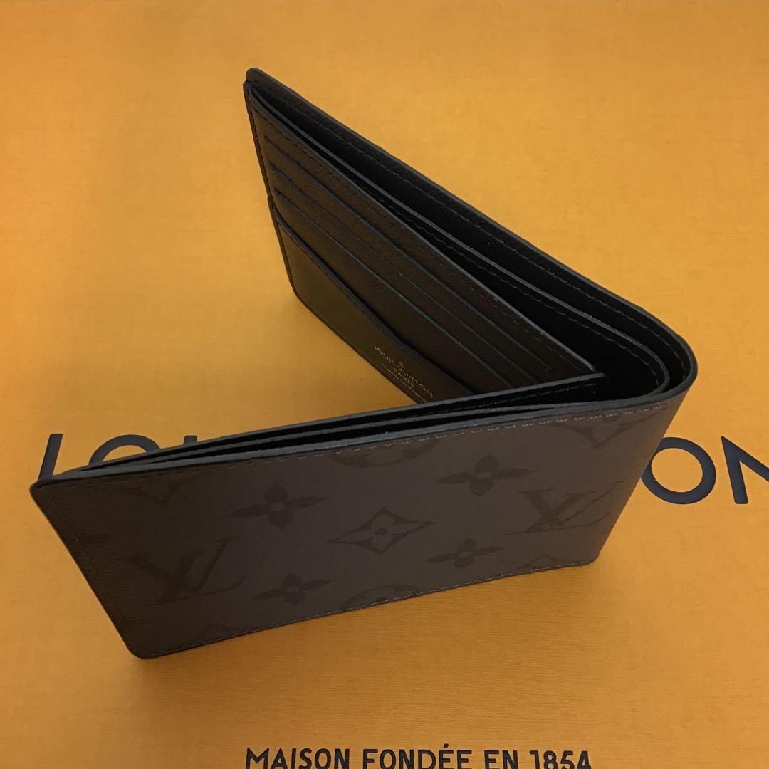 ❣️未使用に近い❣️ LOUIS VUITTON 二つ折り財布　M80906